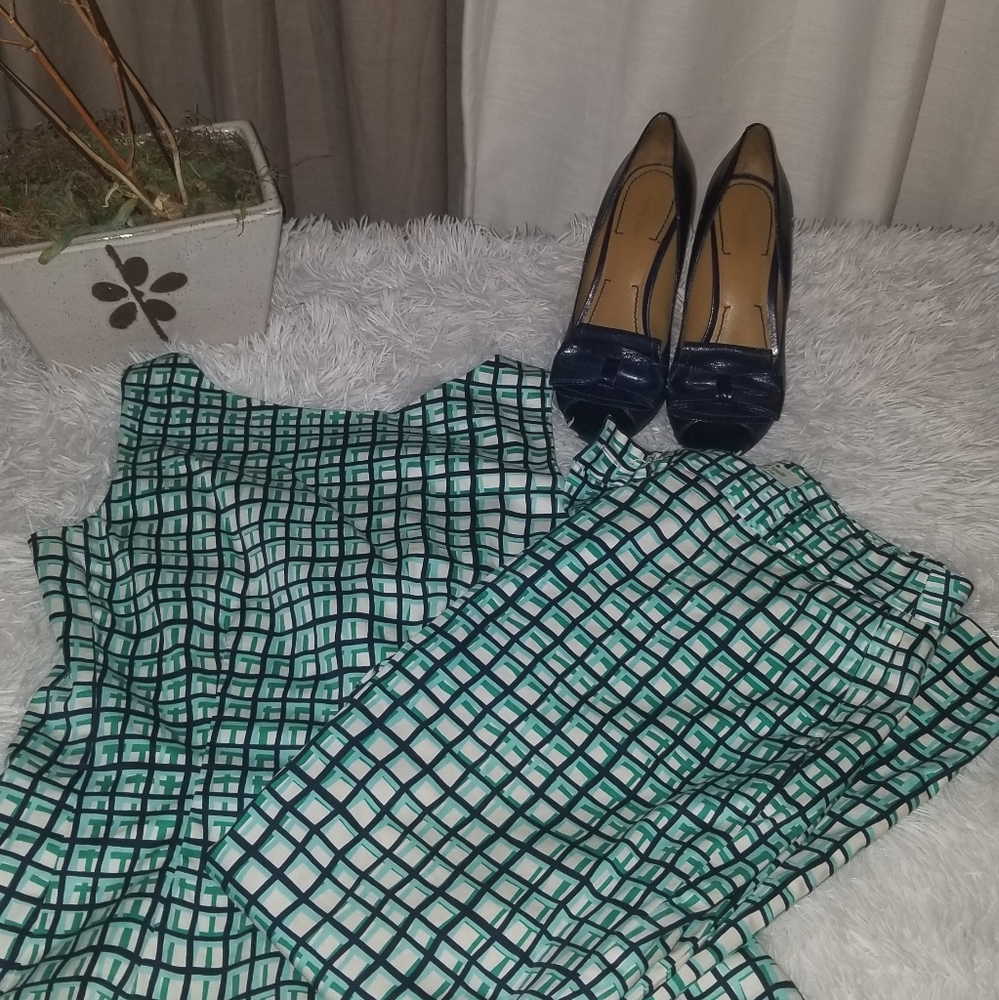 Kate spade 2 peice ankle pants and peplum top. Pants 4 top a small.